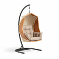 Hanging chair with rattan backrest cushion and steel frame in natural color